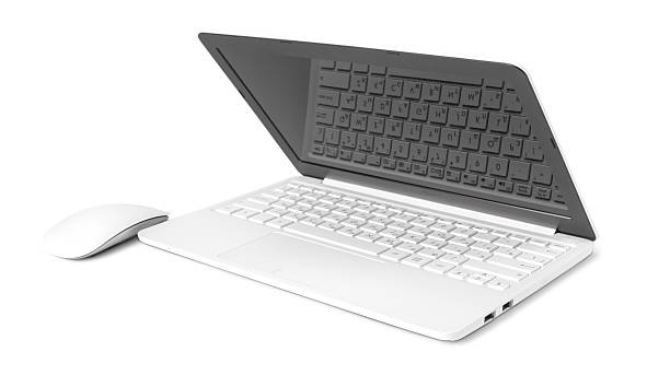 A modern laptop and wireless mouse on a clean white background emphasize simplicity.