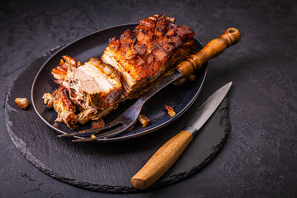 Delicious and juicy prepared pork belly with  crispy skin