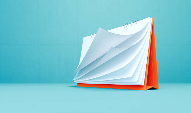 istock Blank Desk Calendar On Blue Background 2250884143