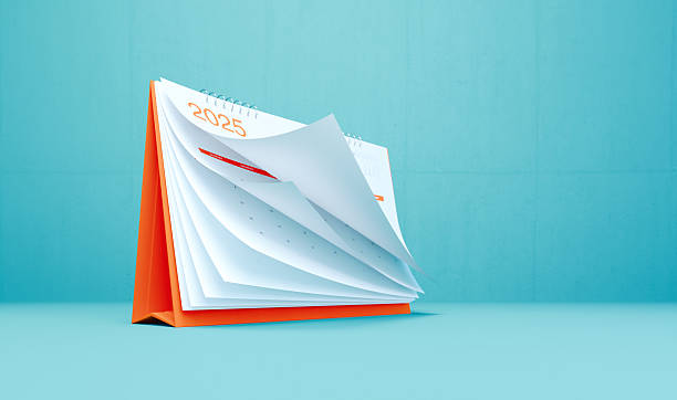 istock 2025 Desk Calendar On Blue Background 2250885063