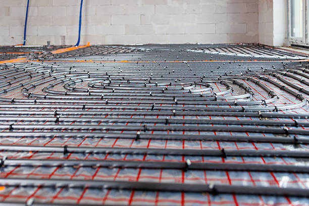 istock Underfloor heating system installation in new house 2250887295