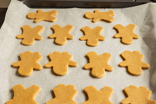 istock Raw Gingerbread Cookies in Tray – Holiday Baking Preparation 2250890502