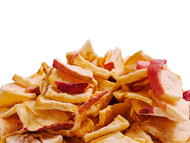 istock Dried apple slices stacked in a pile for healthy snacking 2250894295