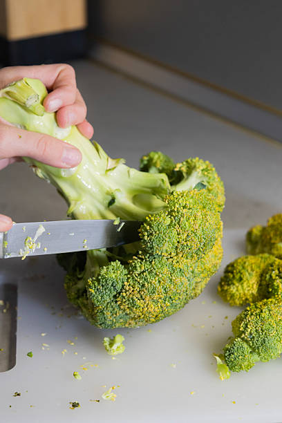 istock Slicing Fresh Broccoli into Florets – Healthy Kitchen Preparation 2250896928