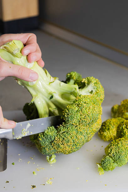istock Slicing Fresh Broccoli into Florets – Healthy Kitchen Preparation 2250896931