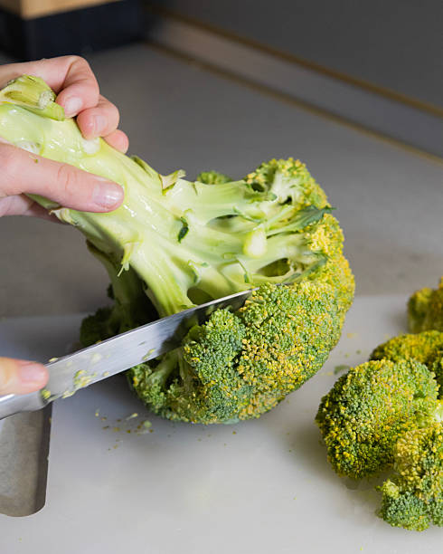 istock Slicing Fresh Broccoli into Florets – Healthy Kitchen Preparation 2250896934