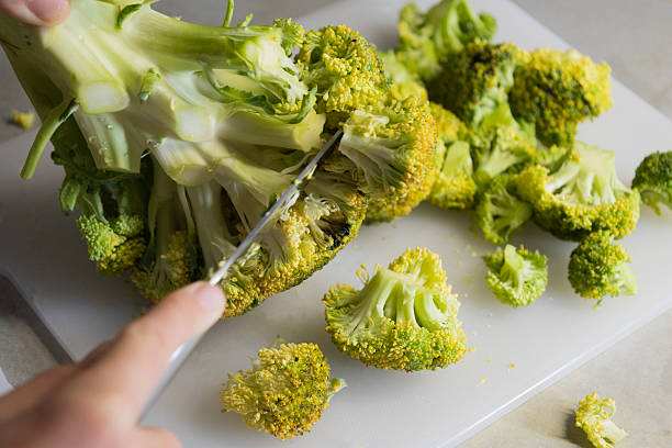 istock Slicing Fresh Broccoli into Florets – Healthy Kitchen Preparation 2250896936