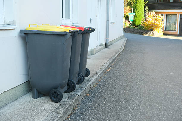 istock Garbage sorting in Europe. Garbage cans with colorful lids for different types of garbage 2250901256