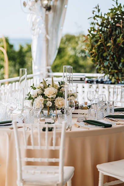 istock Wedding table with fresh flowers decoration. Forest / garden wedding 2250902264