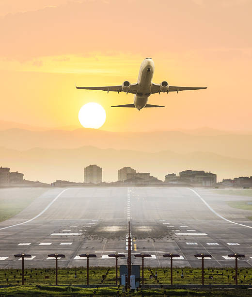 istock Passenger airplane taking off at sunset 2250903084