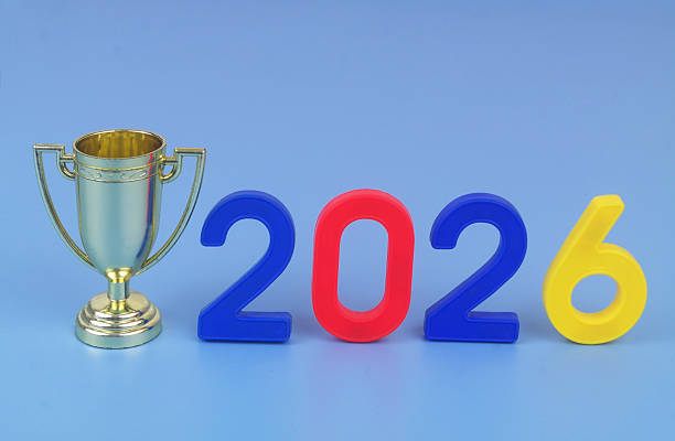 istock Gold trophy champion cup and numbers 2026 on blue background. 2250904013