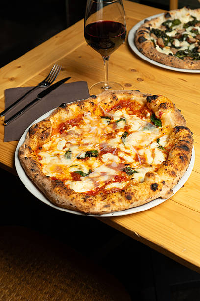 istock Margherita Pizza with Lard on a Plate at a Pizzeria 2250905922