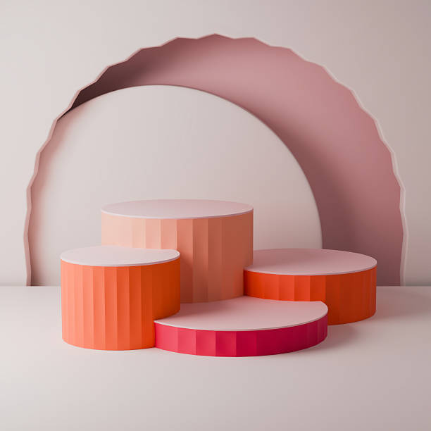 istock Minimal 3D studio background with tiered pink and orange podiums and geometry 2250915140