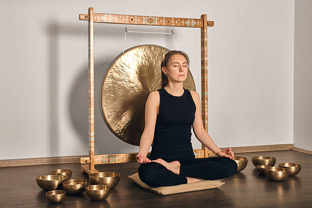 istock Serene gong meditation with singing bowls in tranquil space 2250917158