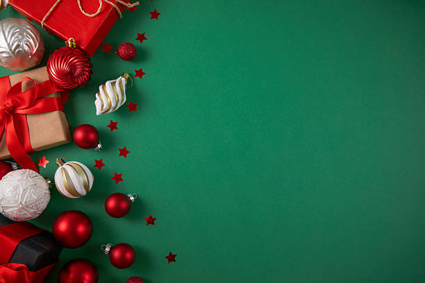 istock Green Christmas background with ornaments 2250929372