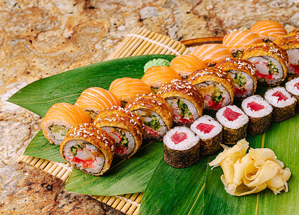 istock Sushi platter with a variety of rolls served on a bamboo mat 2250933391