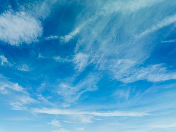 istock Vibrant Blue Sky with White Clouds in a Beautiful Summer Day 2250941131