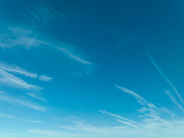 istock Vibrant Blue Sky with White Clouds in a Beautiful Summer Day 2250941152