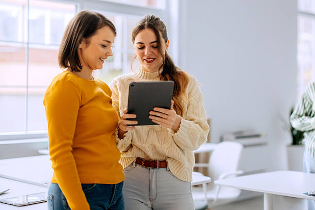 istock Two female colleagues using digital tablet at the office 2250941257