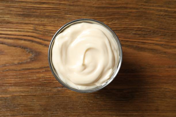 istock Bowl with mayonnaise on gray background 2250946729