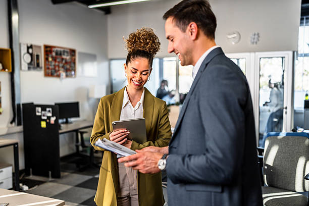 istock Business colleagues collaborating on digital tablet in office 2250946757