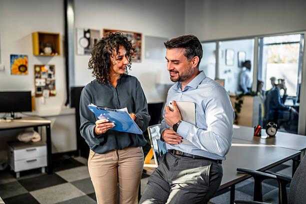 istock Business colleagues discussing project ideas in modern office 2250947017