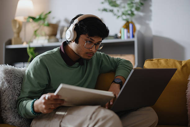 istock Indian male student studying remotely from home, using a laptop 2250953702