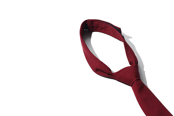 istock red tie knot, isolated on white background 2250955535