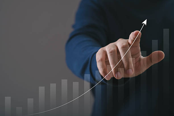 istock Hand pointing at rising growth line graph symbolizing business success, financial improvement, performance analytics, and strategic progress, ideal for marketing, investment, and corporate development 2250958955