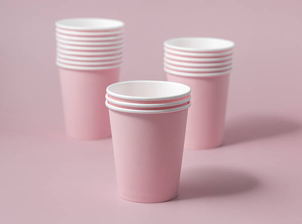 istock Disposable light pink paper cups closeup, mockup, copy space. No plastic biodegradable single-use 2250963204