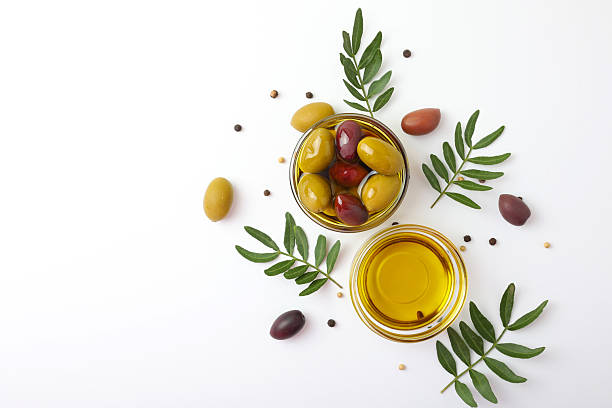 istock A premium olive oil with olives and fresh leaves, 2250964018