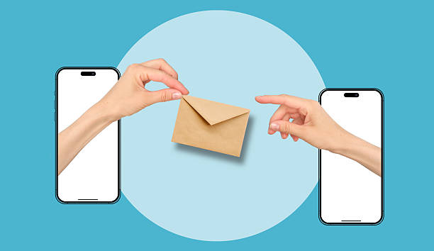 istock Two cell phones are shown with one person holding an envelope 2250965693
