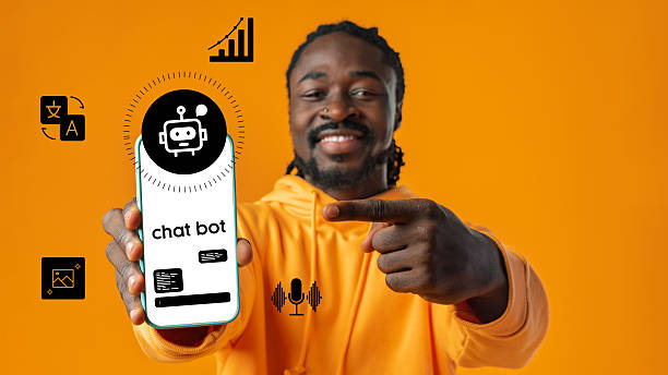 istock Man showcasing chatbot app on smartphone while standing against vibrant orange background 2250969886