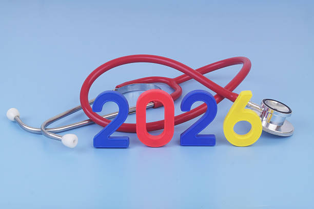 istock Red stethoscope and numbers 2026 on blue background. 2250972558