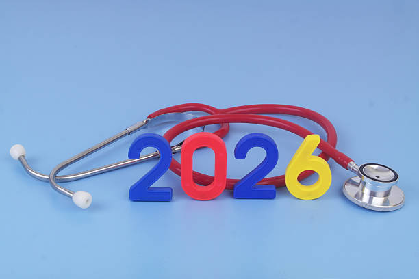 istock Red stethoscope and numbers 2026 on blue background. 2250972600
