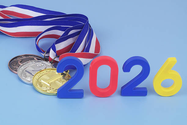 istock Gold, silver and bronze medal with numbers 2026 on blue background. 2250972683