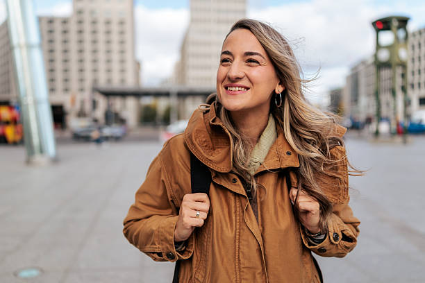 istock Smiling Woman Exploring the City 2250973005