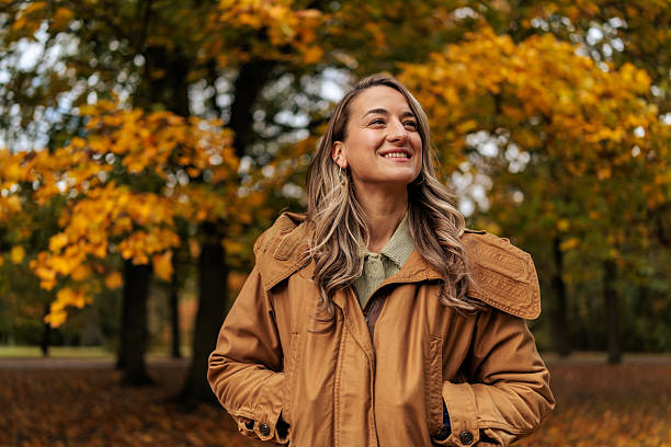 istock Smiling Woman Outdoors in Autumn 2250973958
