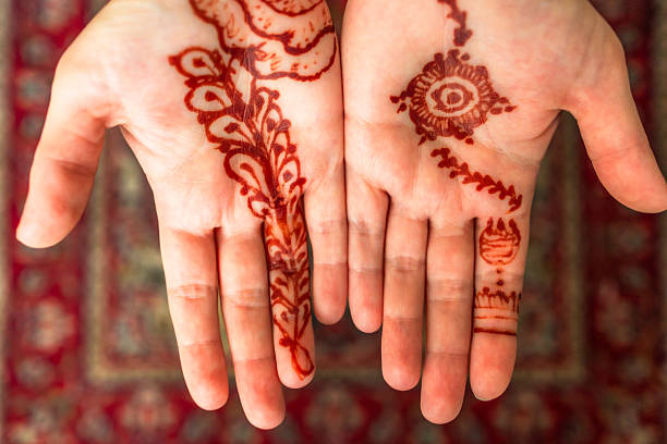 istock Close up of Henna design on white hands 2250974540