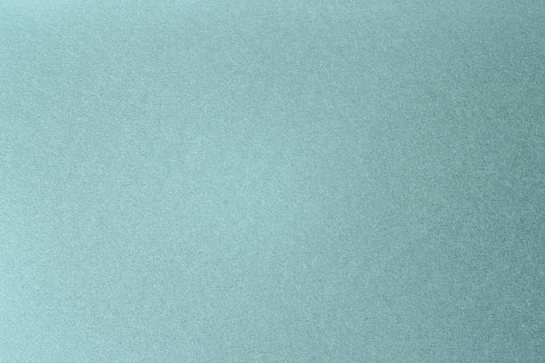 istock Green wallpaper texture with small grains 2250975939