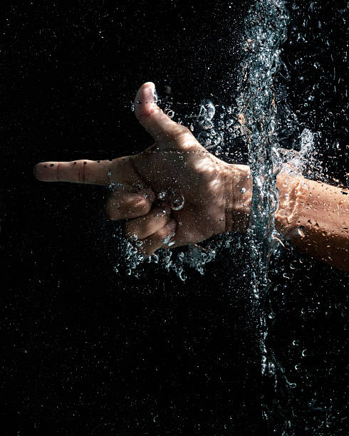 istock Hand gestures in the water with splashes 2250977372