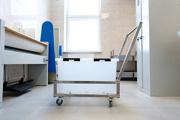 istock Clean and modern workspace featuring a rolling cart in a well-lit room designed for efficient operations 2250977909