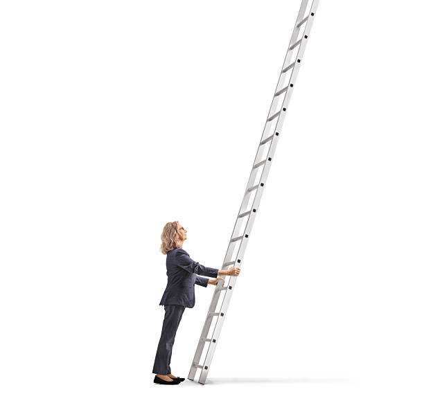 istock Woman holding a tall ladder 2250982610
