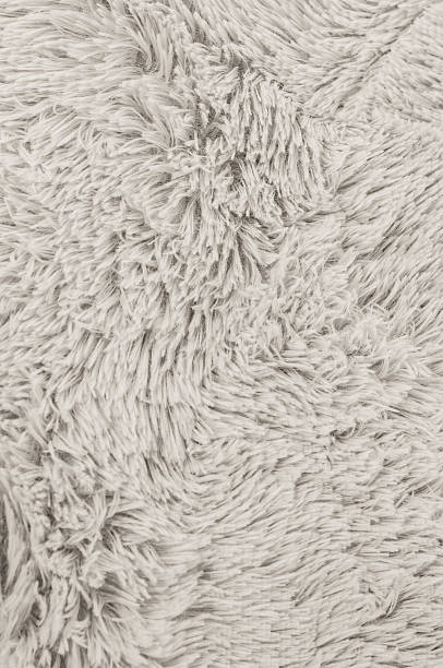 istock Close-up of a soft, fluffy, and textured Cloud Dancer fabric background 2250983052