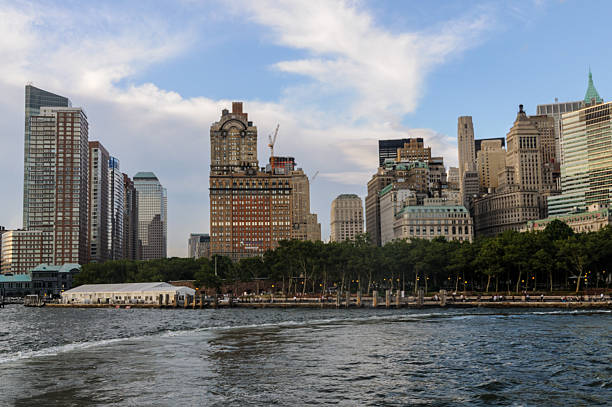 Jersey City, United States - July 4, 2009. Outdoor scene showing the lower manhattan waterfront in New York City on a sunny summer evening.