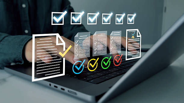 istock Businessman check virtual electronic documents and checklist approve.Quality assurance,guarantee, standards, certification and standardization.Business productivity checklist and filling survey form 2250988141