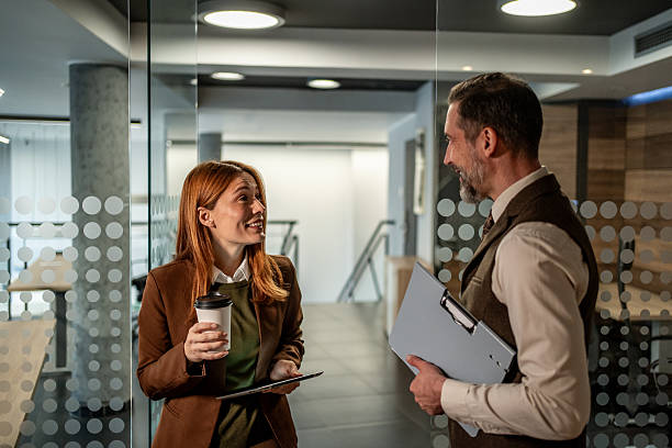 istock Business colleagues having a coffee break discussion in office 2250989897