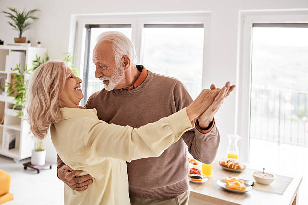 istock Joyful Senior Couple Dancing After Breakfast 2250991318
