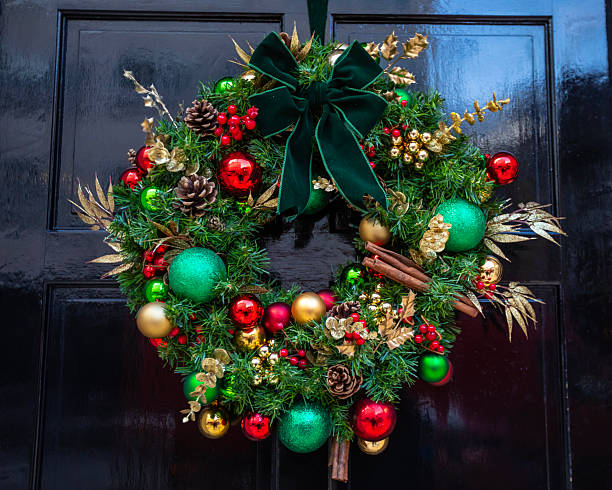 istock Festive Christmas Wreath on a Door 2250993248