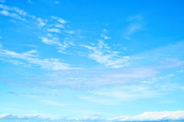 Masai Mara, Kenya - February 10, 2015 - An unidentified alone African masai man is dancing under the blue sky for the money at masai village, very close the masai mara national reserve at oloolaimutia gate on February 23, 2014 in Masai Mara, Kenya. The Masai people are a Nilotic ethnic group of semi-nomadic people located in Kenya and Tanzania.